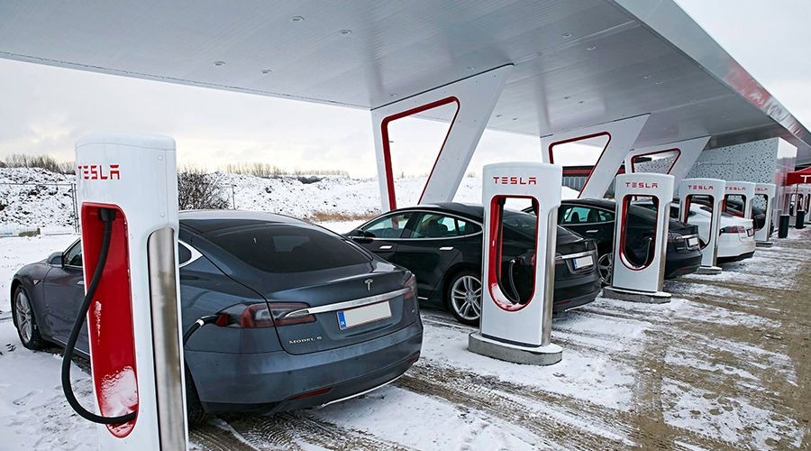 teslas parked together